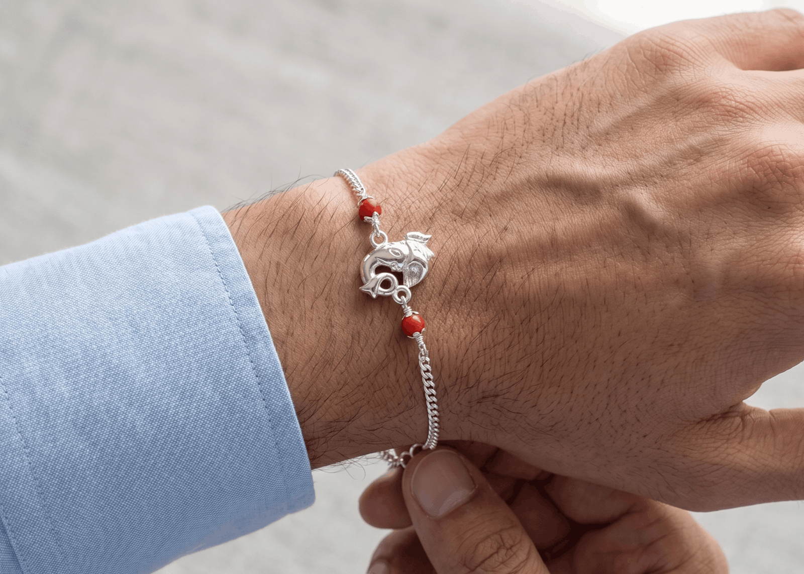 Auspicious Ganesha Silver Chain Rakhi